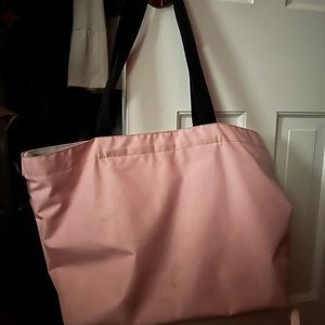 Large Herve Chapelier tote - pink with cream detail near the zipper.